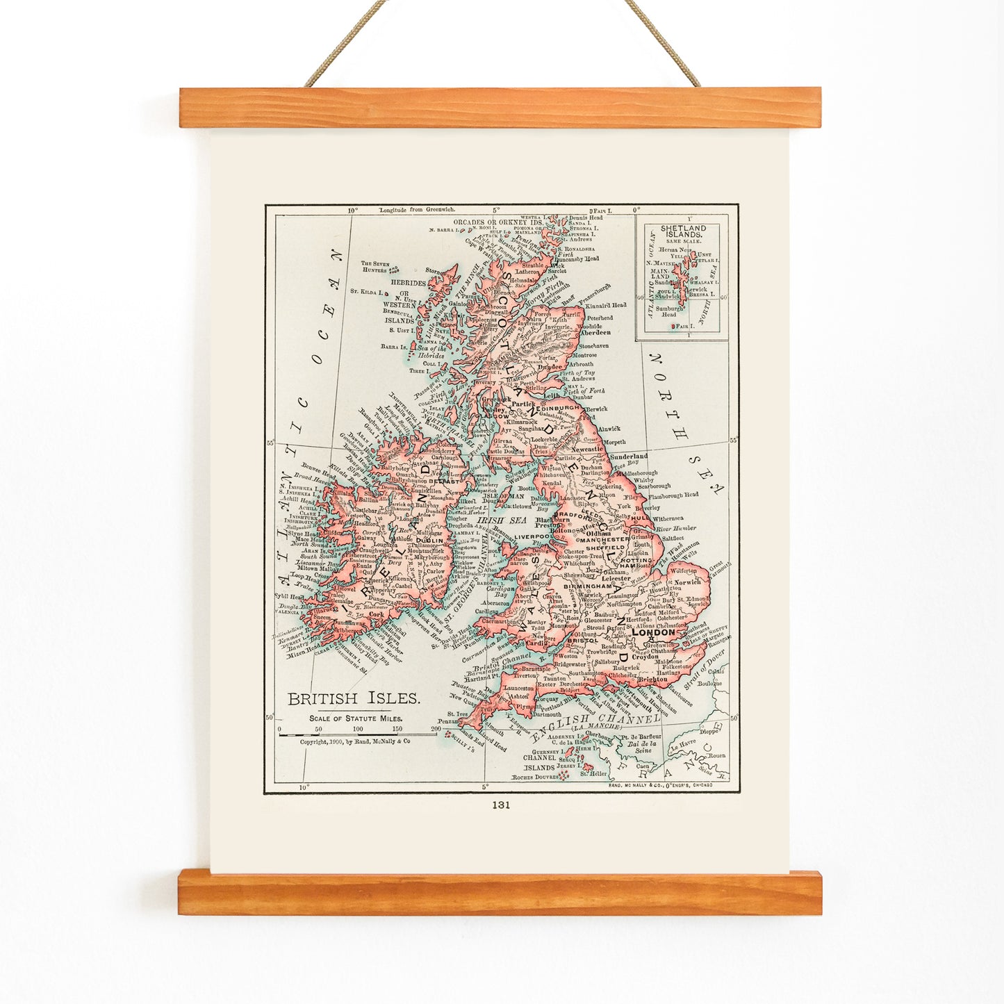 Vintage cartographic map of the British Isles from Universal Atlas of the World as detailed artwork poster, with wooden magnetic frame on white background
