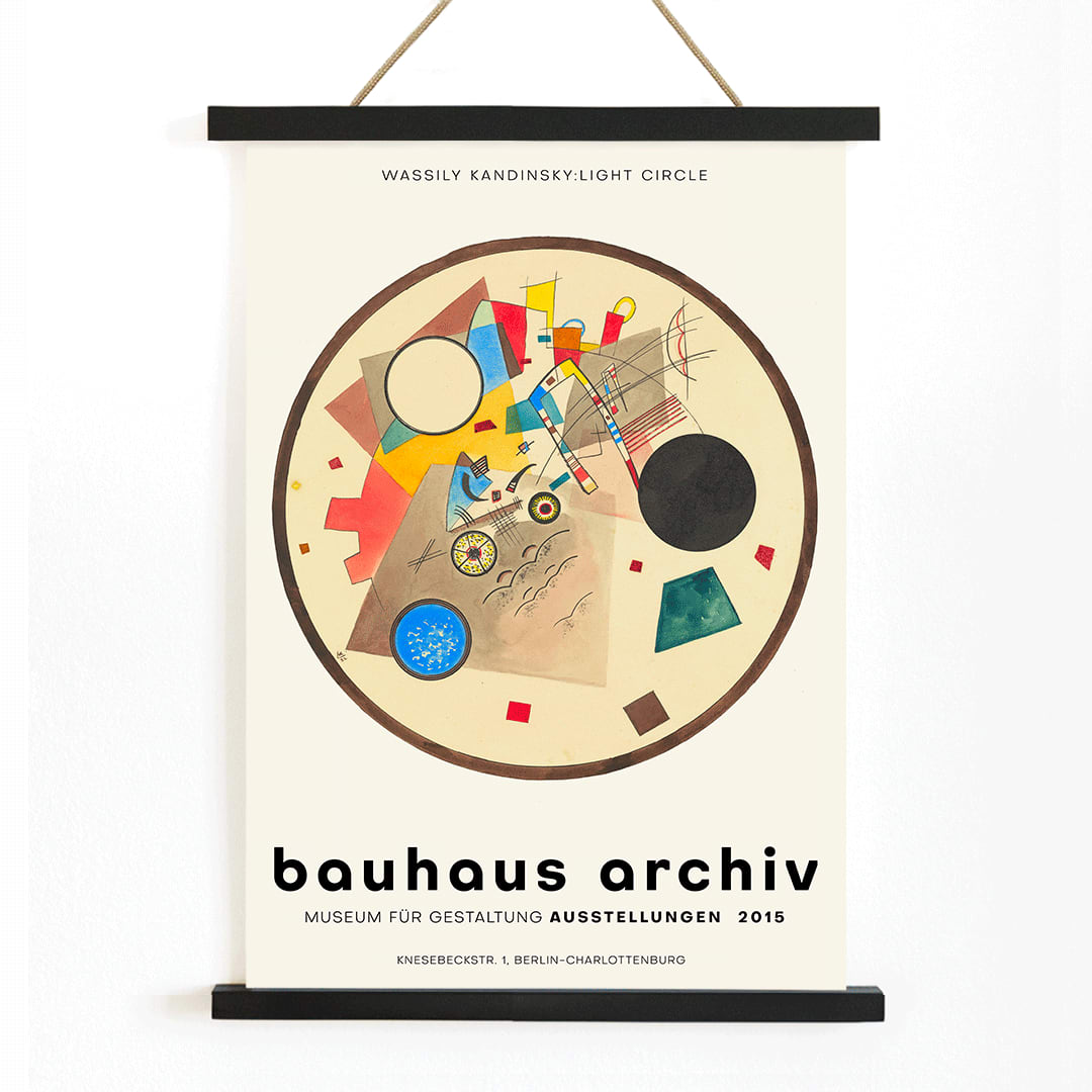 Abstract geometric artwork Light Circle by Wassily Kandinsky from Bauhaus exhibition poster displayed at Bauhaus Archiv Museum, with wooden magnetic frame on white background