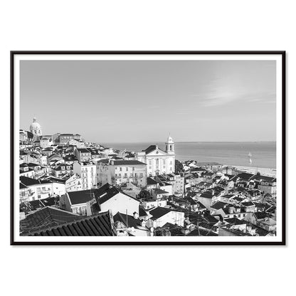 Black and white landscape poster of Alfama Lisbon Old City with traditional buildings and Tagus River by artist Alfama Lisbon, with black aluminium frame on white background