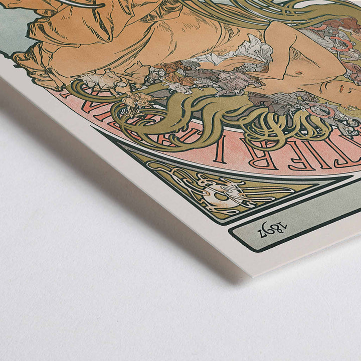 Closeup detail of Alphonse Mucha Au Quartier Latin poster with elegant woman and flowing floral tendrils in soft peach green and cream tones