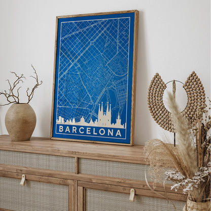 Minimalist blue and white map of Barcelona by Moryarty featuring iconic landmarks street layout and skyline poster titled Minimalist Map of Barcelona 2, framed and displayed in home decor