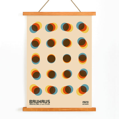 Bauhaus Poster 9 Inspired by the Weimar Exhibition with overlapping colorful circles in a geometric pattern on a beige background, with wooden magnetic frame on white background