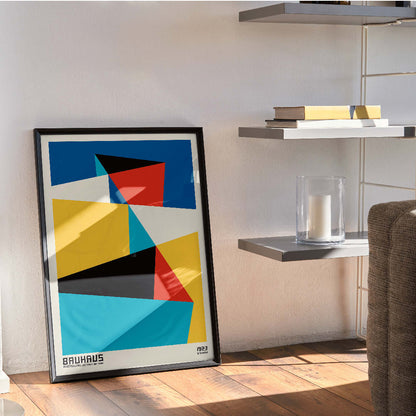 Bauhaus poster 15 by Schlemmer featuring abstract geometric shapes and geometric abstract art in primary colors, framed and displayed in home decor