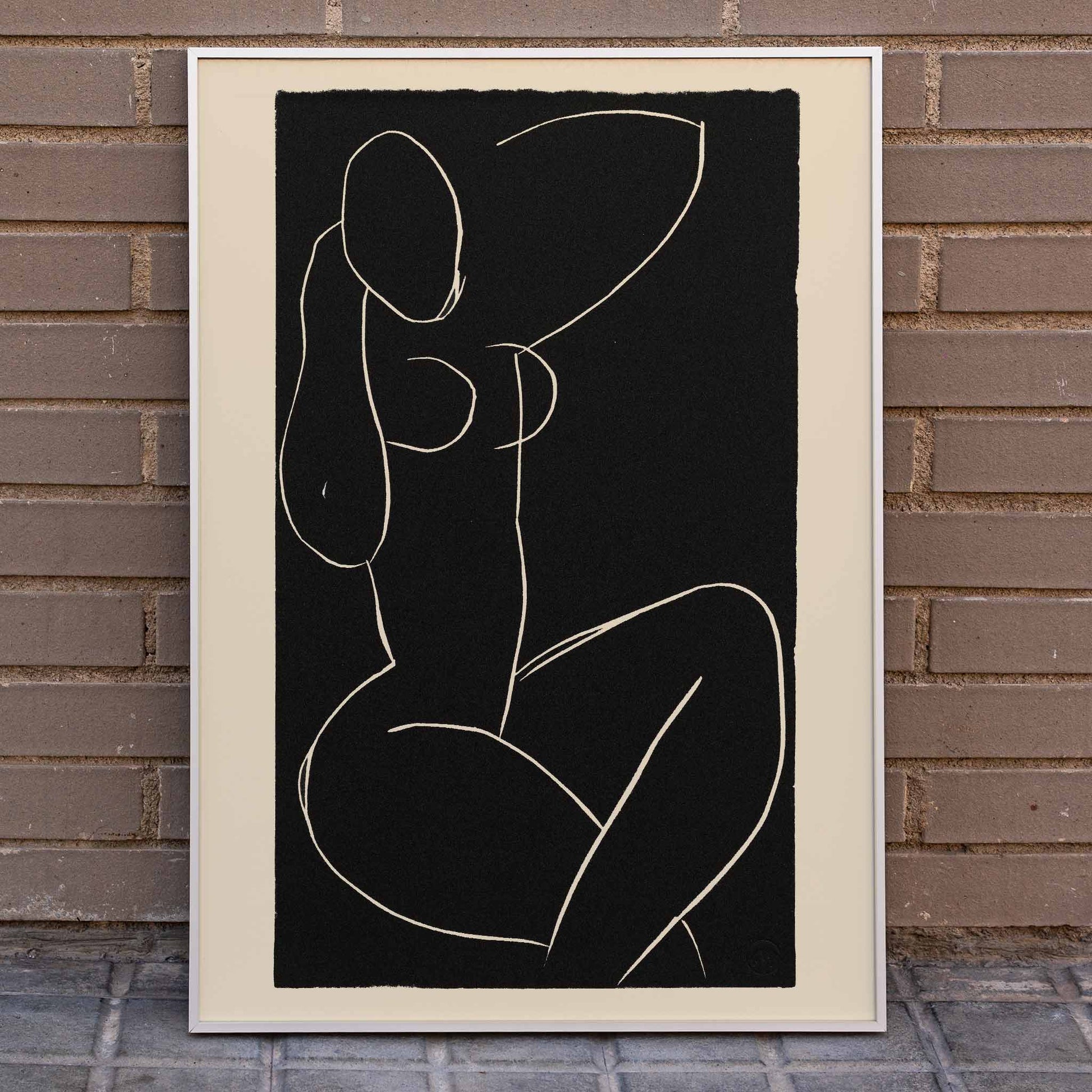 Henri Matisse Seated Nude with Crossed Legs I poster minimalist black and white nude line drawing on dark background, framed and displayed in home decor