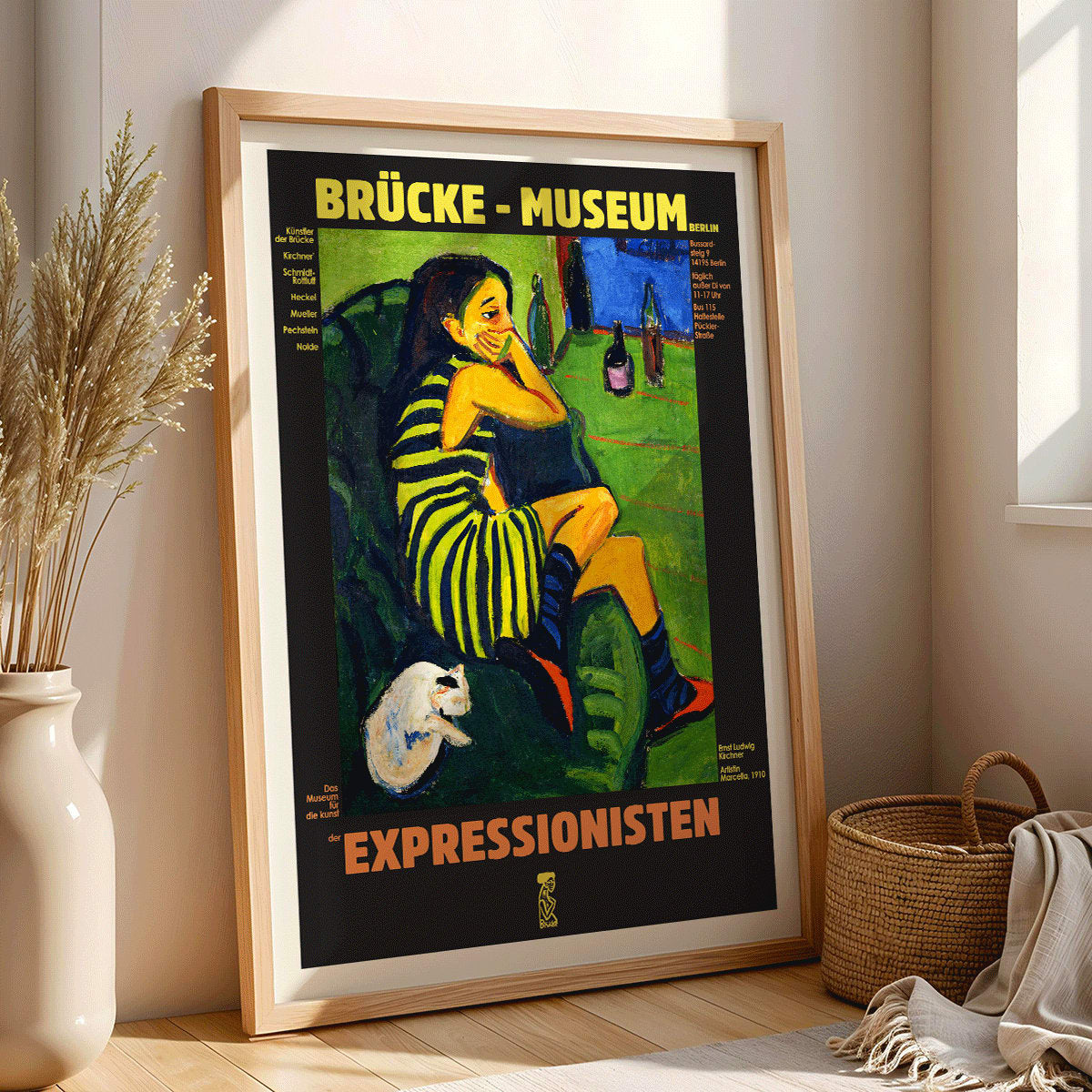 Brucke museum exhibition poster of Female Artist by Ernst Ludwig Kirchner showing a colorful expressionist scene, framed and displayed in home decor