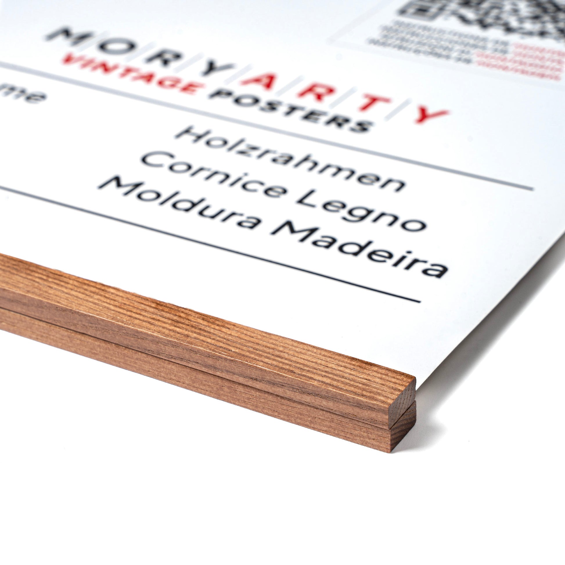 Dark oak magnetic wood frame with natural grain, minimalist design, and attached rope for hanging a poster or artwork on a wall, front corner closeup picture