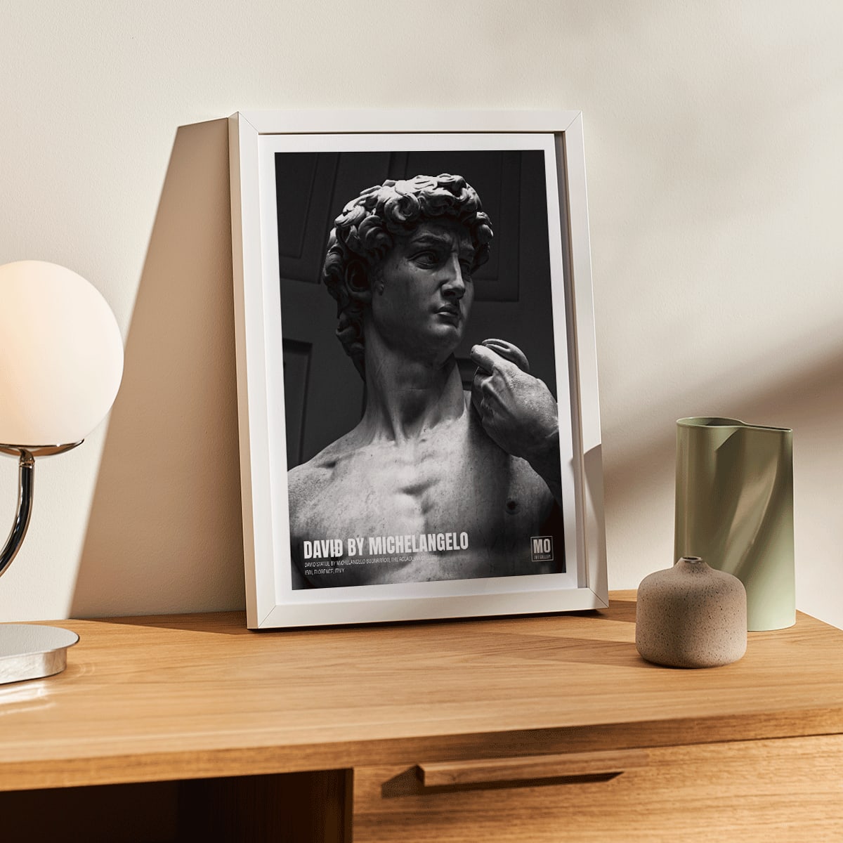 David by Michelangelo Buonarroti classic sculpture and grayscale poster from Mo Art Gallery Florence, framed and displayed in modern living room decor