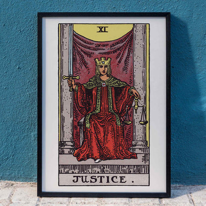 Pamela Colman Smith Justice tarot poster crowned figure in red robes with scales and sword, framed and displayed in home decor