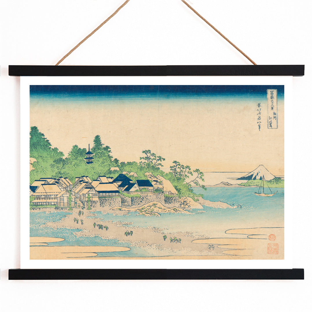 Coastal village with houses trees ocean and Mount Fuji by Katsushika Hokusai Enoshima in Sagami Province Japanese artwork, with wooden magnetic frame on white background