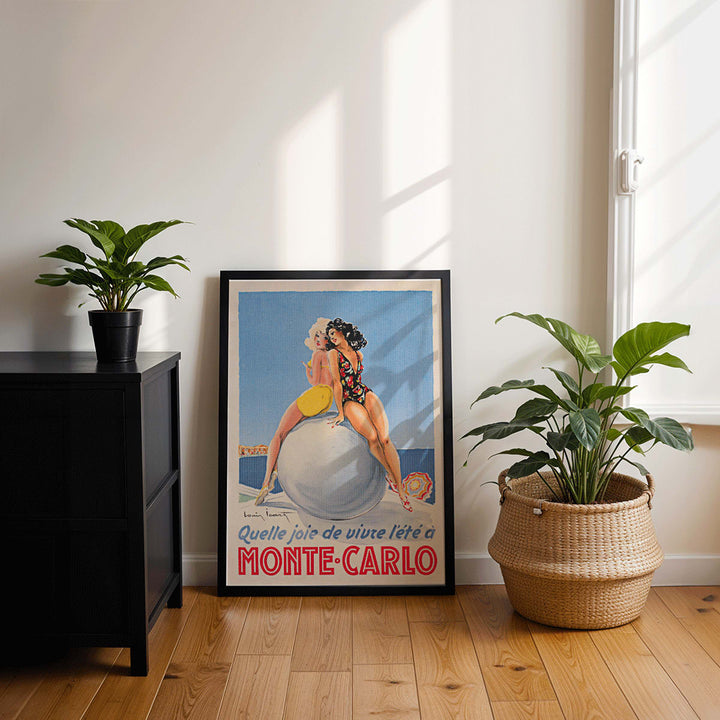 Monte Carlo artwork by Louis Icart showing two women in swimsuits sitting on a large ball at the beach poster, framed and displayed in modern living room decor