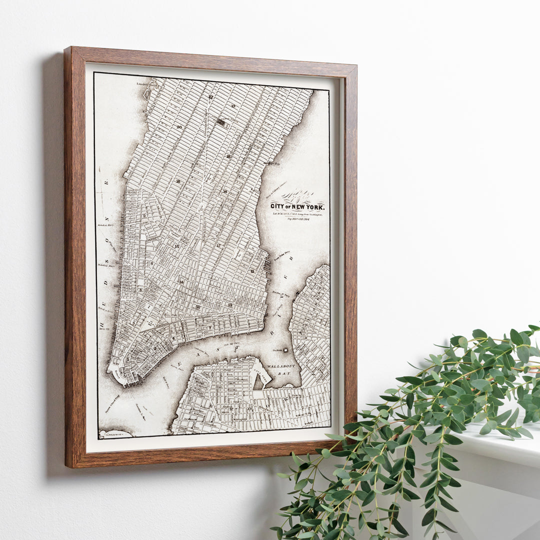 Vintage map of New York City showing detailed streets and layout from Library of Congress Geography and Map Division titled Map of the City of New York, framed and displayed in home decor