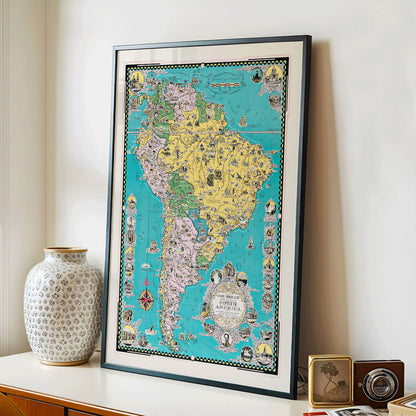 Colorful illustrated map poster of South America by Ernest Dudley Chase titled The Good Neighbor of South America, framed and displayed in modern living room decor