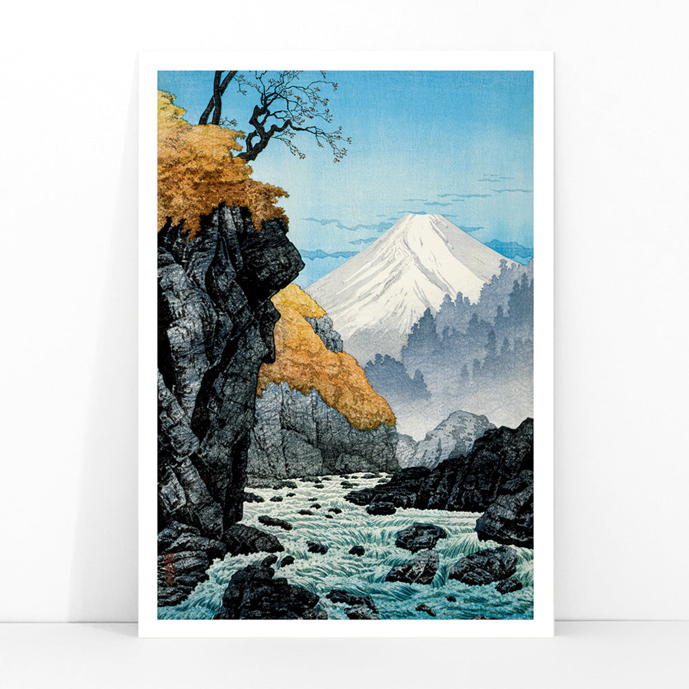 Mountain landscape with river autumn trees and rocky cliffs at Foot of Mount Ashitaka by Hiroaki Takahashi poster, framed and displayed in modern living room decor