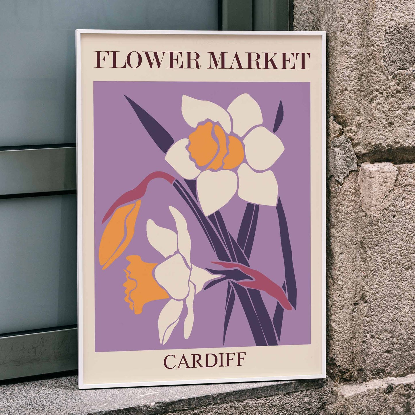 Flower Market Cardiff poster by Moryarty featuring yellow and white illustrated daffodils on a purple background, framed and displayed in home decor