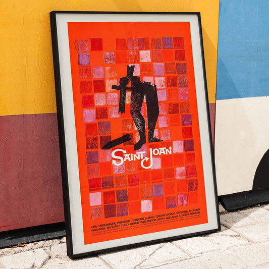 Abstract red and black Saint Joan Movie poster by Saul Bass with stylized figure on checkered background and abstract red squares, framed and displayed in home decor
