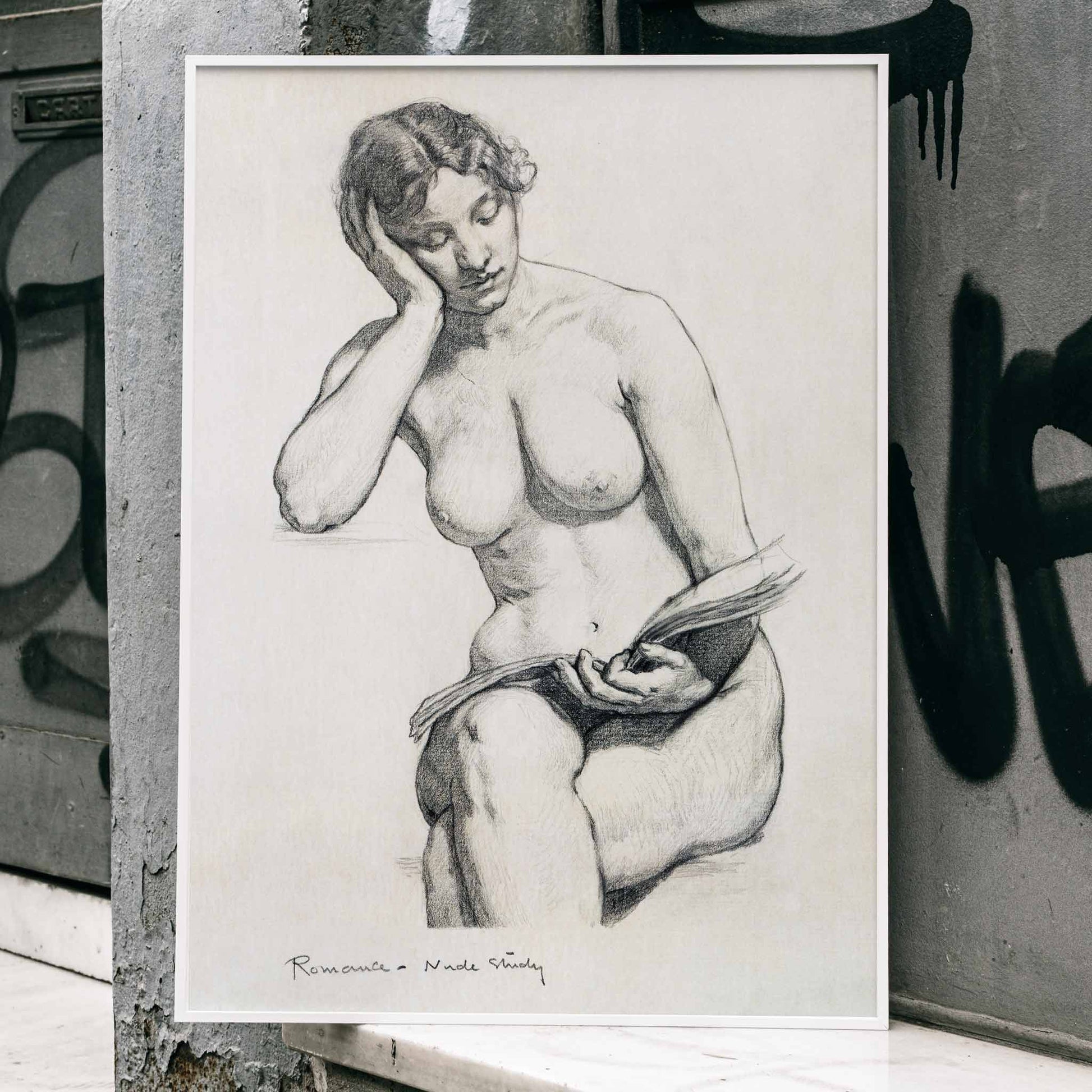 Nude Study 1896 by Kenion Cox pencil sketch of a seated nude woman reading a book contemplative expression art poster, framed and displayed in home decor