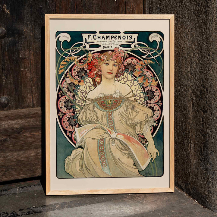 Art Nouveau poster by Alphonse Mucha featuring an elegant woman in a floral dress with flowers in her hair Affiche Champenois Imprimeur, framed and displayed in home decor