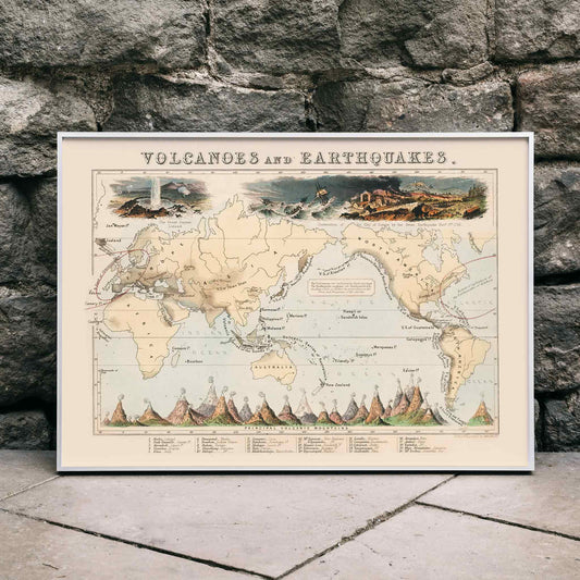 Map and poster illustration of volcanic and earthquake zones by James Reynolds titled Phenomena of Volcanoes and Earthquakes, framed and displayed in home decor