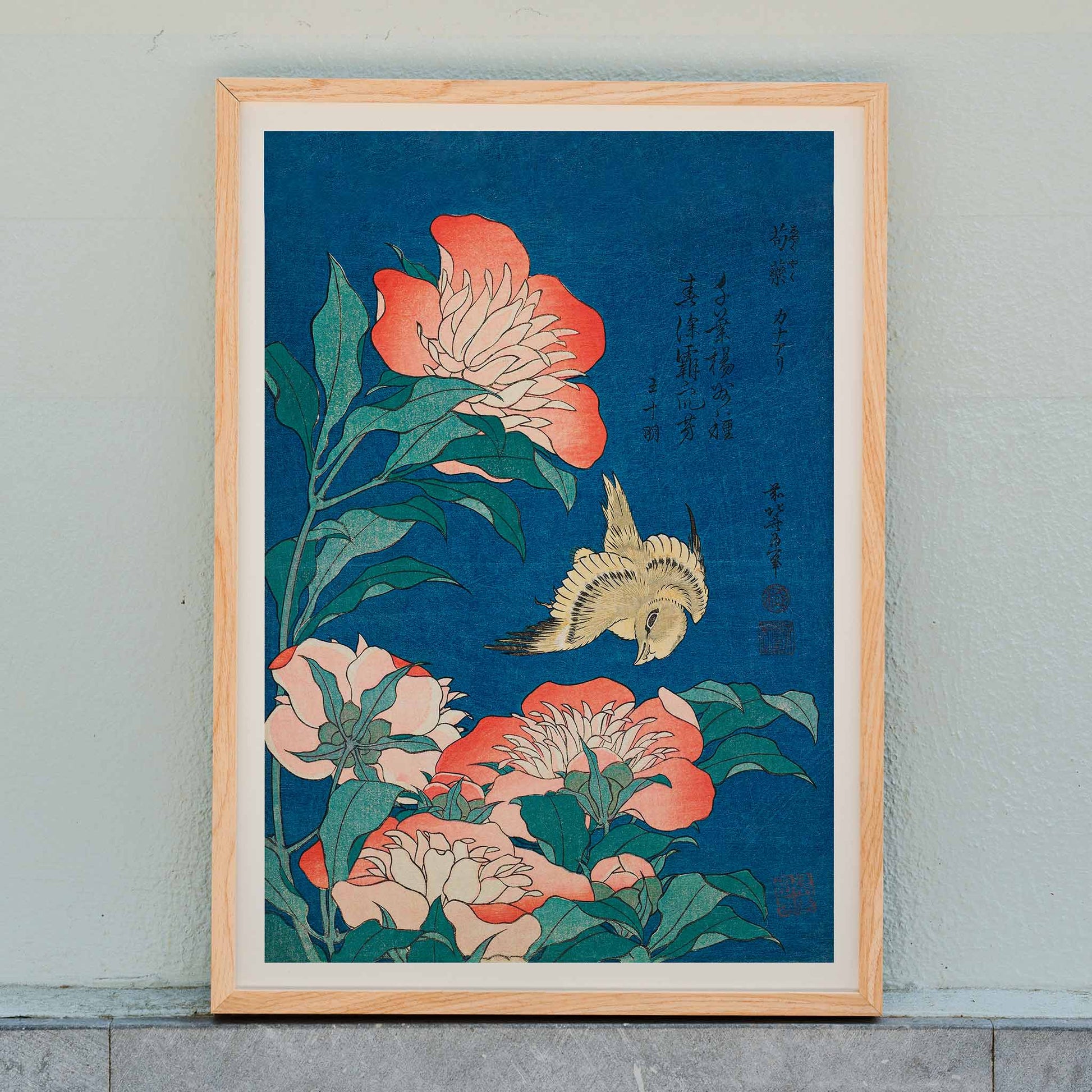 Peonies and canary by Katsushika Hokusai featuring a canary bird among blooming peonies with blue background artwork poster, framed and displayed in home decor