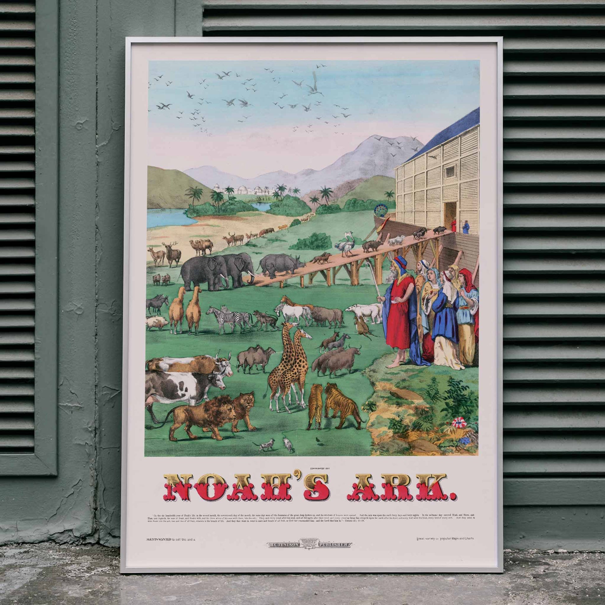 Noahs Ark illustration and poster by H C Tunison showing animals boarding a large wooden ark with mountains and palm trees in the background, framed and displayed in home decor