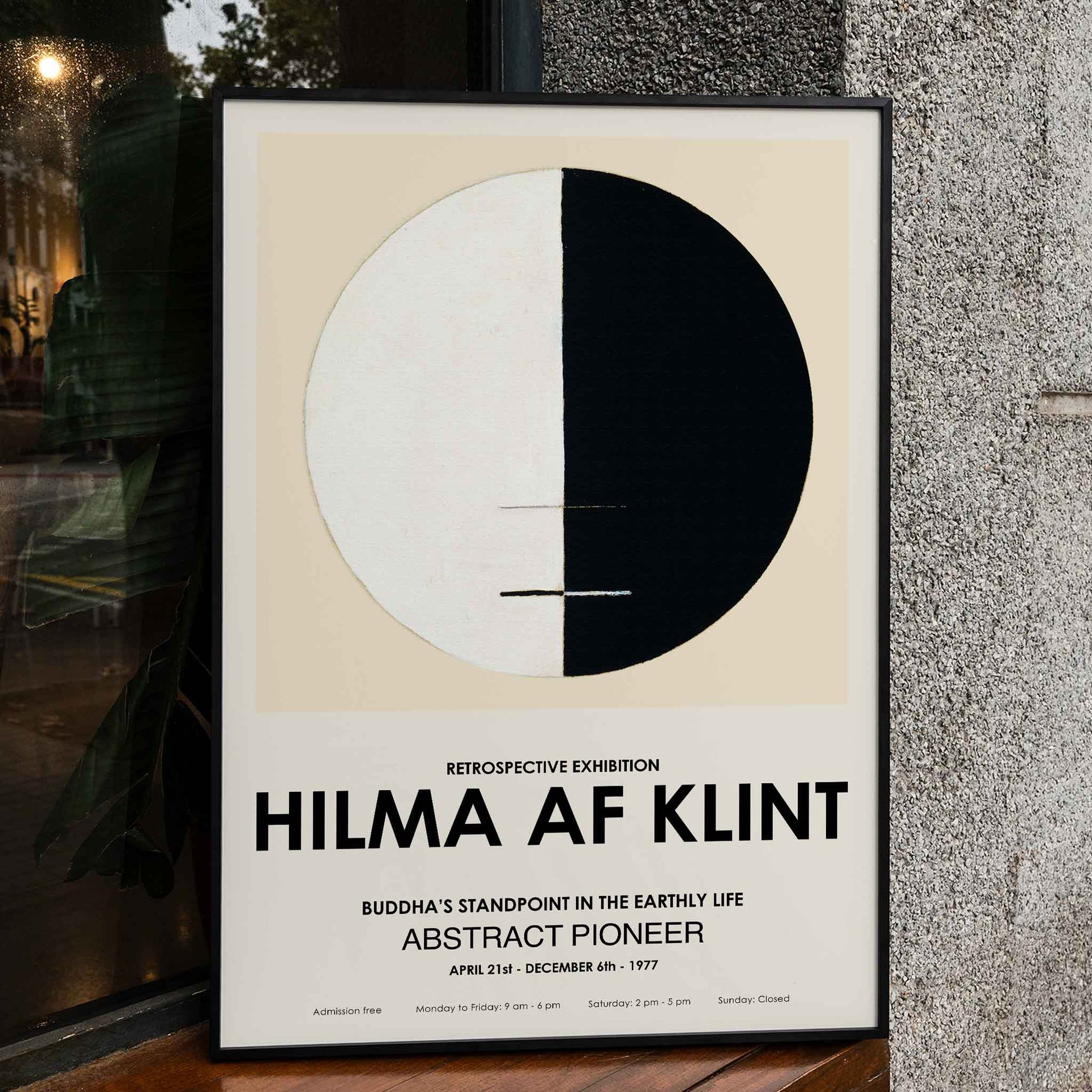 Exhibition poster Buddhas Standpoint in the Earthly Life by Hilma Af Klint featuring abstract black and white circle design artwork, framed and displayed in home decor