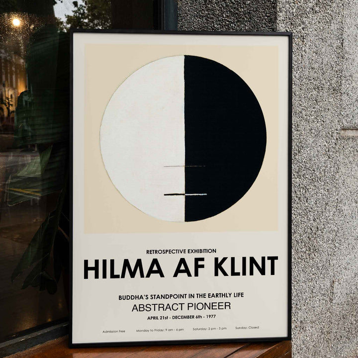 Exhibition poster Buddhas Standpoint in the Earthly Life by Hilma Af Klint featuring abstract black and white circle design artwork, framed and displayed in home decor