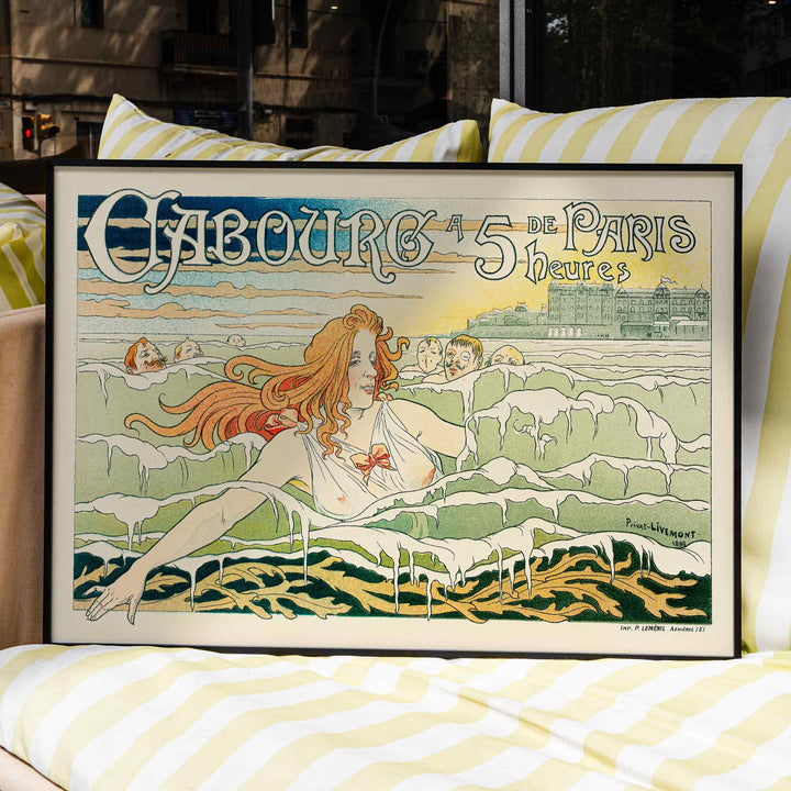 Art Nouveau poster of a red haired woman with flowing hair swimming in the sea near Casino De Cabourg by Henri Privat Livemont, framed and displayed in home decor