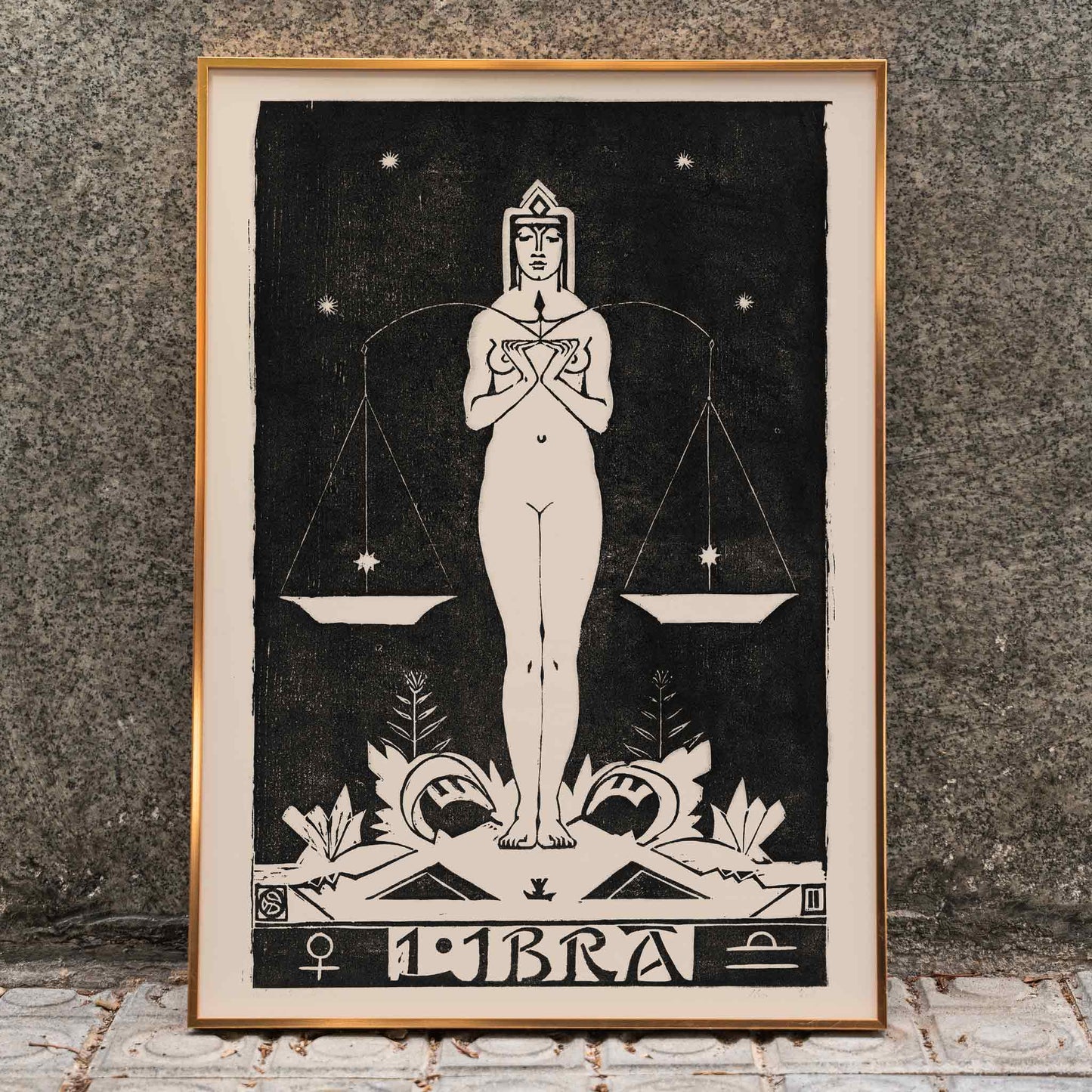 Art Nouveau Libra zodiac sign illustration by Henri van der Stok featuring a woman holding balanced scales and stars, framed and displayed in home decor