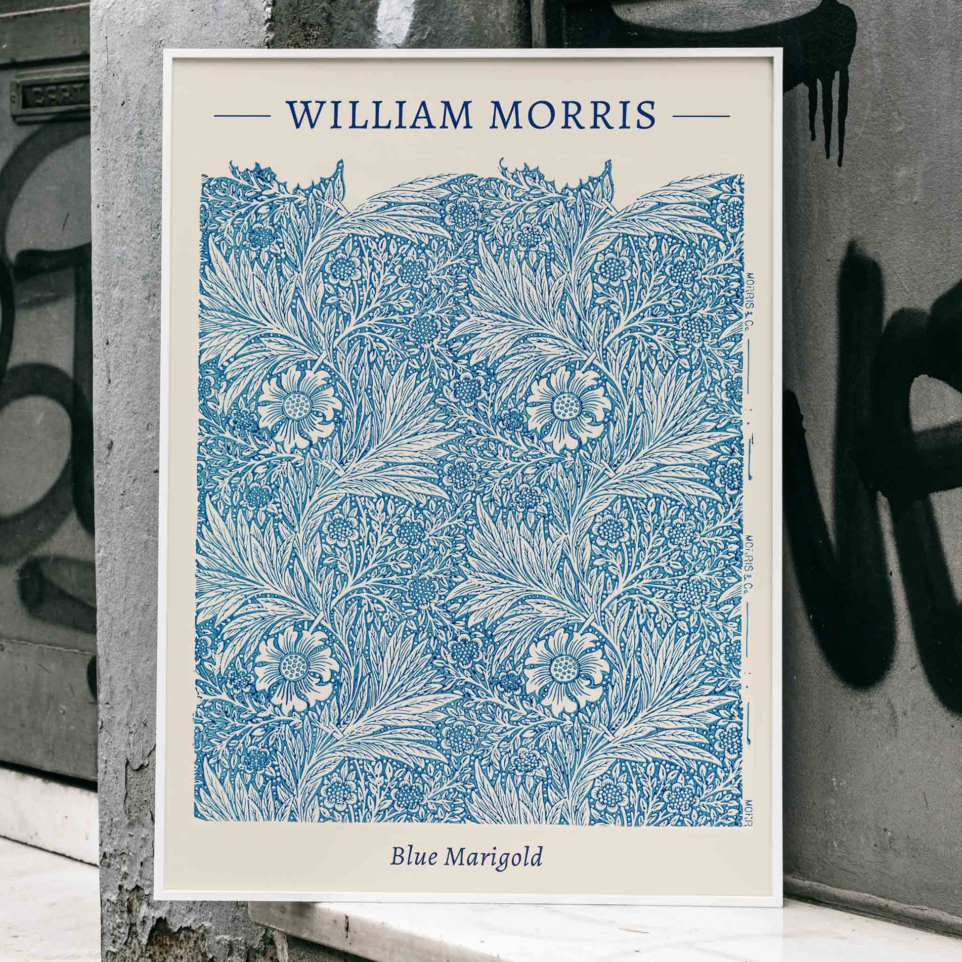 Blue Marigold illustration by William Morris featuring intricate blue floral patterns and leafy designs poster and artwork, framed and displayed in home decor