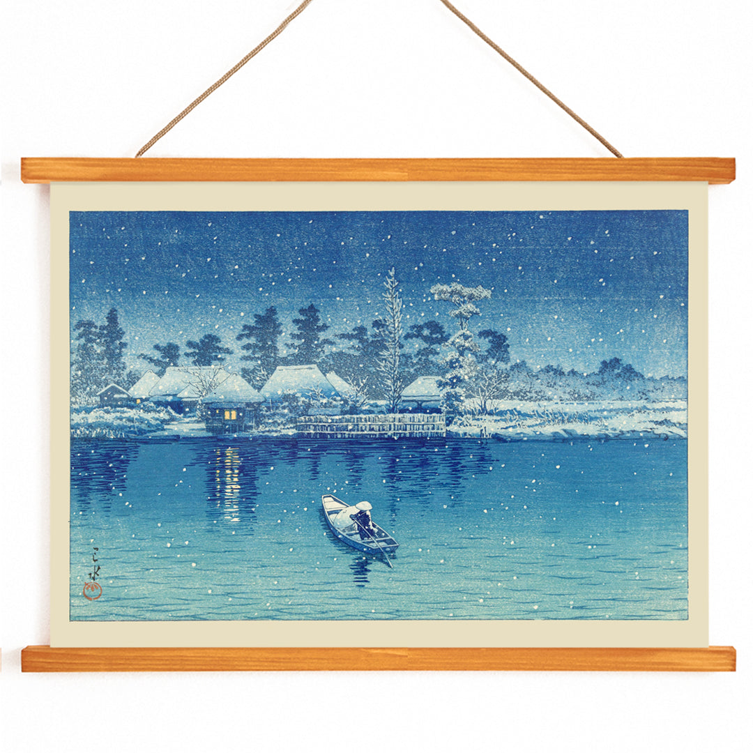 Snowy riverside village at night with boat and person by Kawase Hasui Ushibori Japanese art poster, with wooden magnetic frame on white background