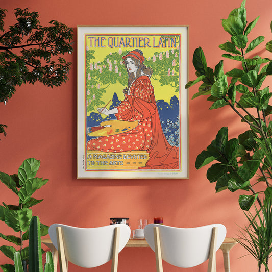 Art Nouveau poster The Quartier Latin by Louis Rhead showing a woman artist in a red dress painting with floral background and vibrant outdoor colors, framed and displayed in home decor